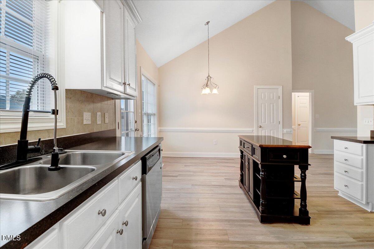 4416 Sunflower Court Wilson, NC 27896 - Photo 24 of 39 a kitchen with a sink and cabinets
