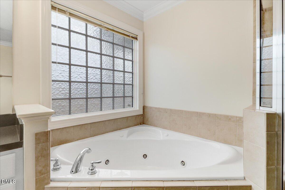 4416 Sunflower Court Wilson, NC 27896 - Photo 31 of 39 a bathroom with a bathtub