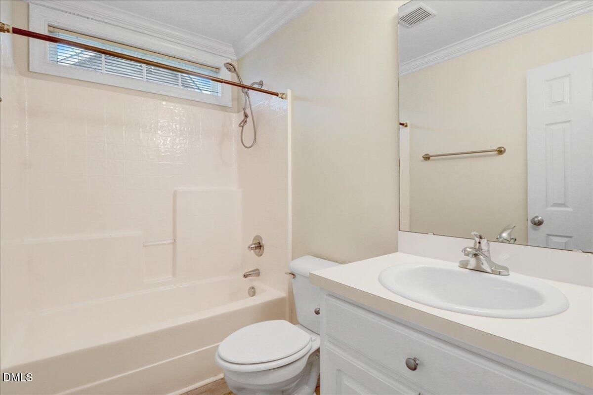 4416 Sunflower Court Wilson, NC 27896 - Photo 35 of 39 a bathroom with a sink toilet and shower