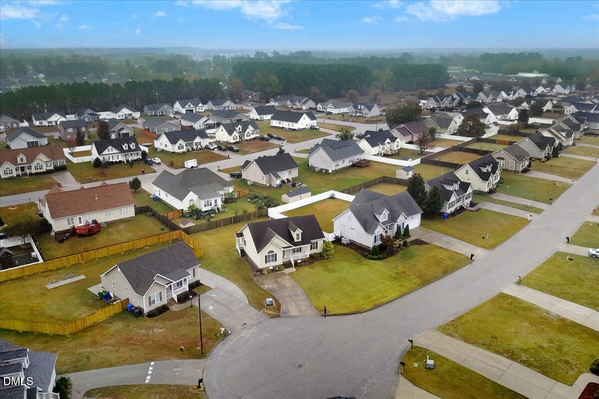 4416 Sunflower Court Wilson, NC 27896 - Photo 8 of 39 an aerial view of a house with outdoor space