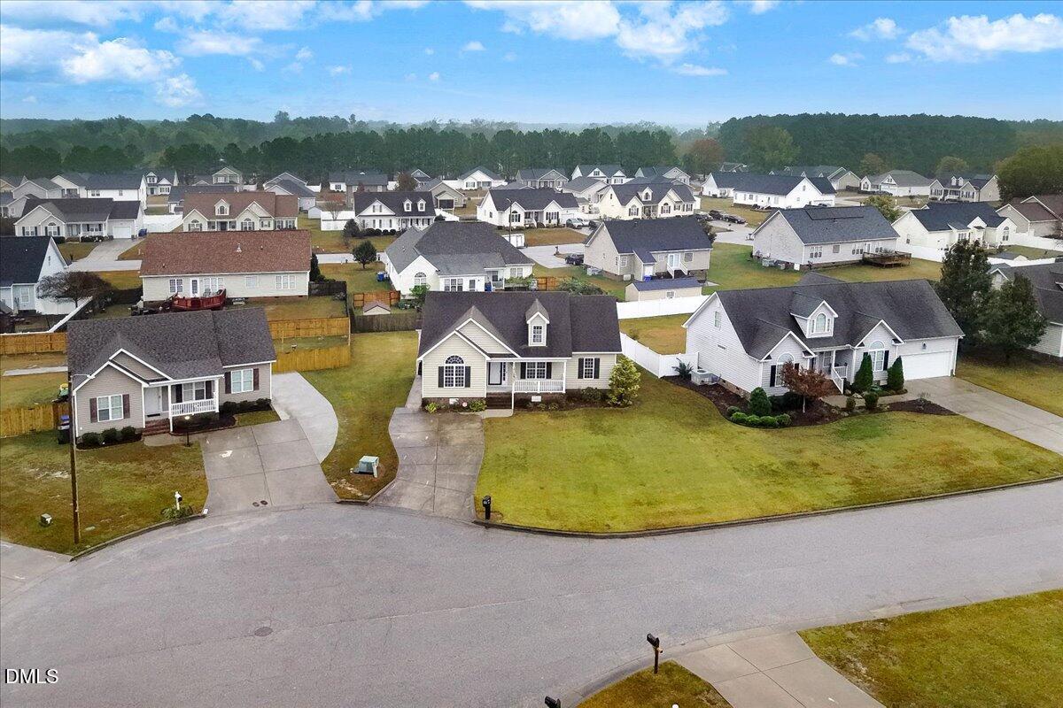 4416 Sunflower Court Wilson, NC 27896 - Photo 9 of 39 an aerial view of a house with a swimming pool yard and outdoor seating