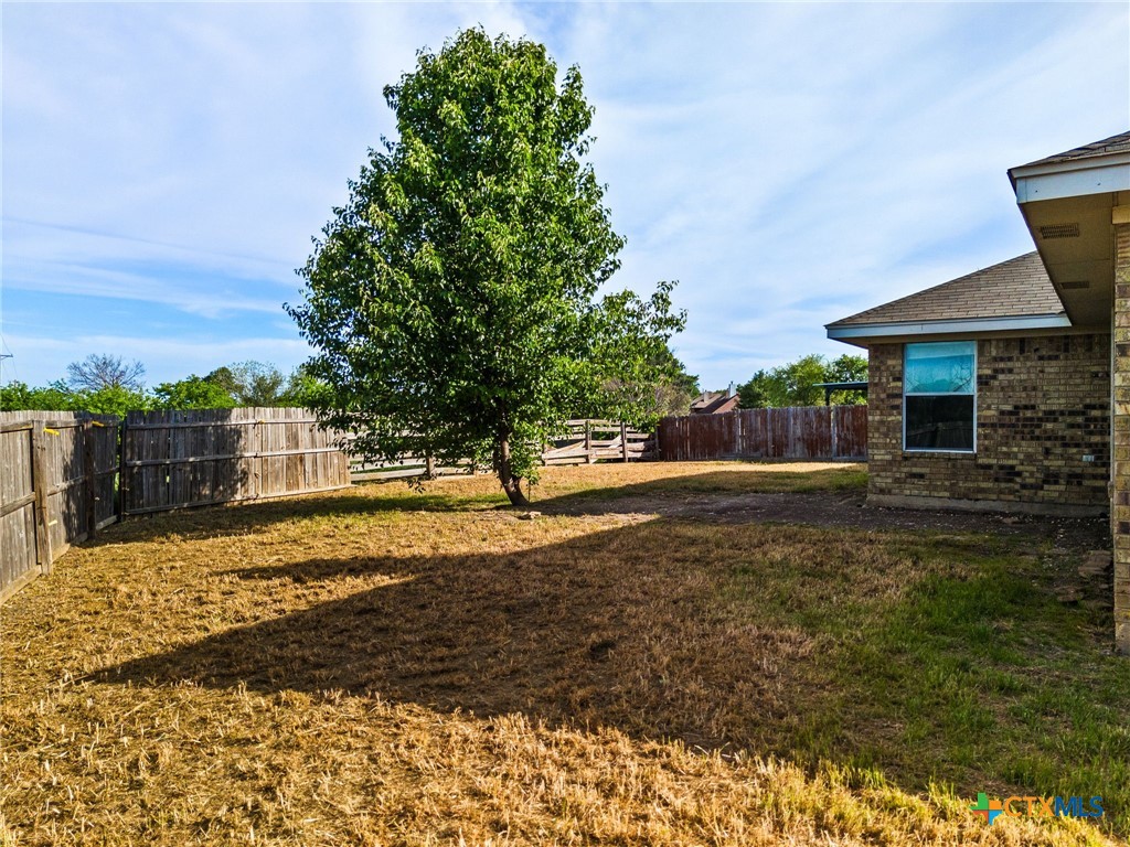 5705 Bald Ridge Court Killeen, TX 76542 - Photo 25 of 28 a view of a house with a yard