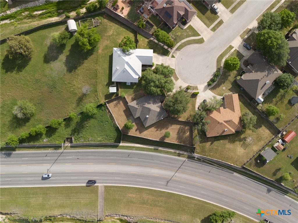5705 Bald Ridge Court Killeen, TX 76542 - Photo 27 of 28 an aerial view of a house with a swimming pool
