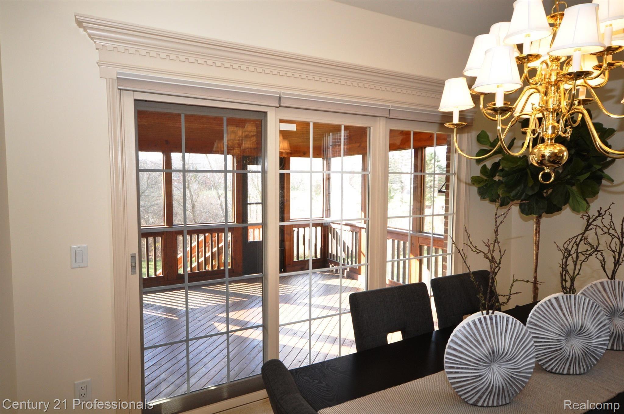 5074 Belmonte Drive Rochester, MI 48306 - Photo 5 of 29 4 Screened Porch off LR.JPG