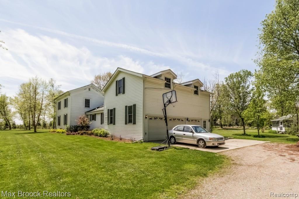 1575 East Leonard Road Leonard, MI 48367 - Photo 29 of 39 051-Side_View-1699356-medium.jpg