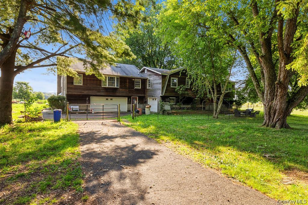 332 Springtown Road New Paltz, NY 12561 - Photo 3 of 19 a front view of a house with garden