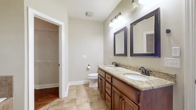 an aerial view of house with a yard