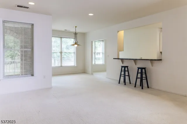 a view of work space with windows