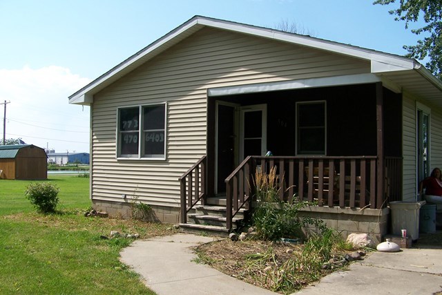 304 East Beech Street Chatsworth, IL 60921 - Photo 1 of 16 a view of a house with a yard