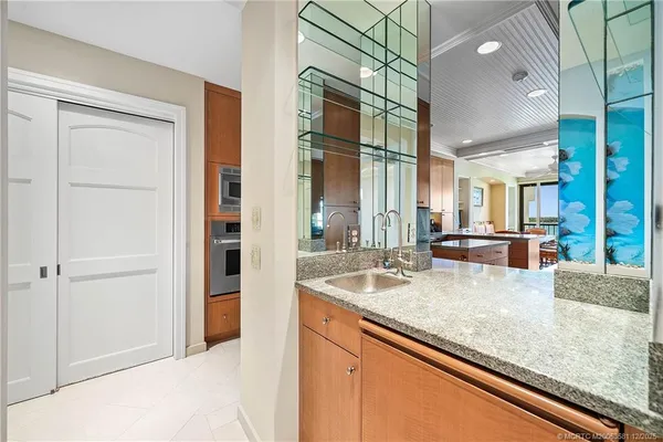a view living room with granite countertop attached living room