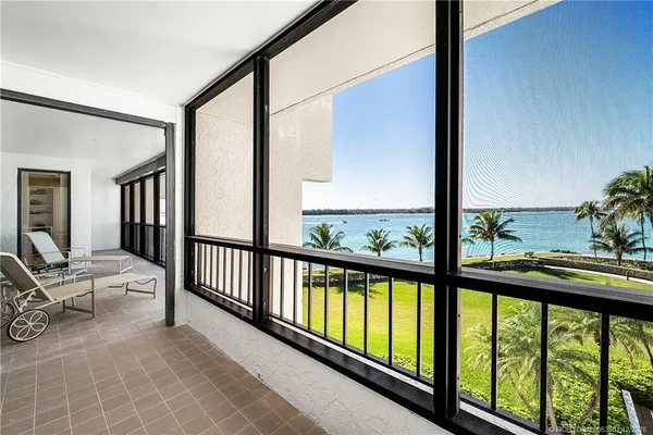 a view of a room with a large window