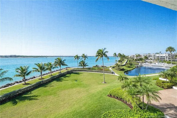 a view of an ocean and city