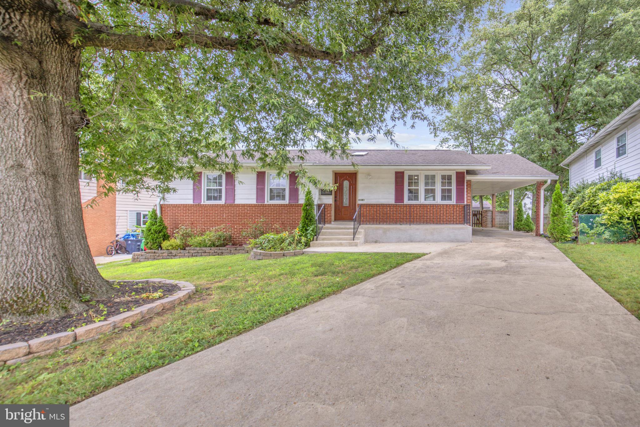 4403 Kinmount Road Lanham, MD 20706 - Photo 1 of 39 front view of a house with a yard