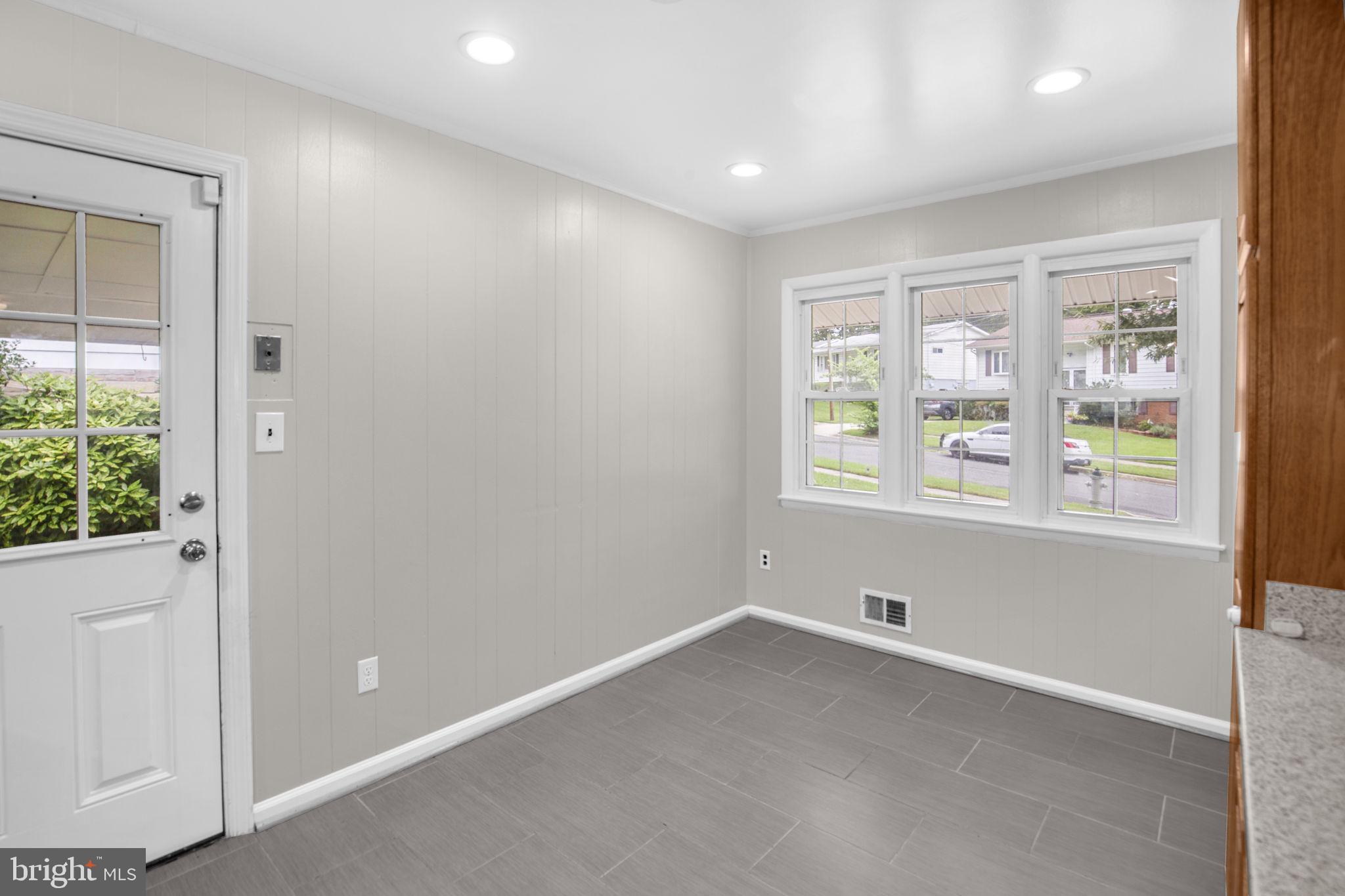 4403 Kinmount Road Lanham, MD 20706 - Photo 12 of 39 an empty room with windows