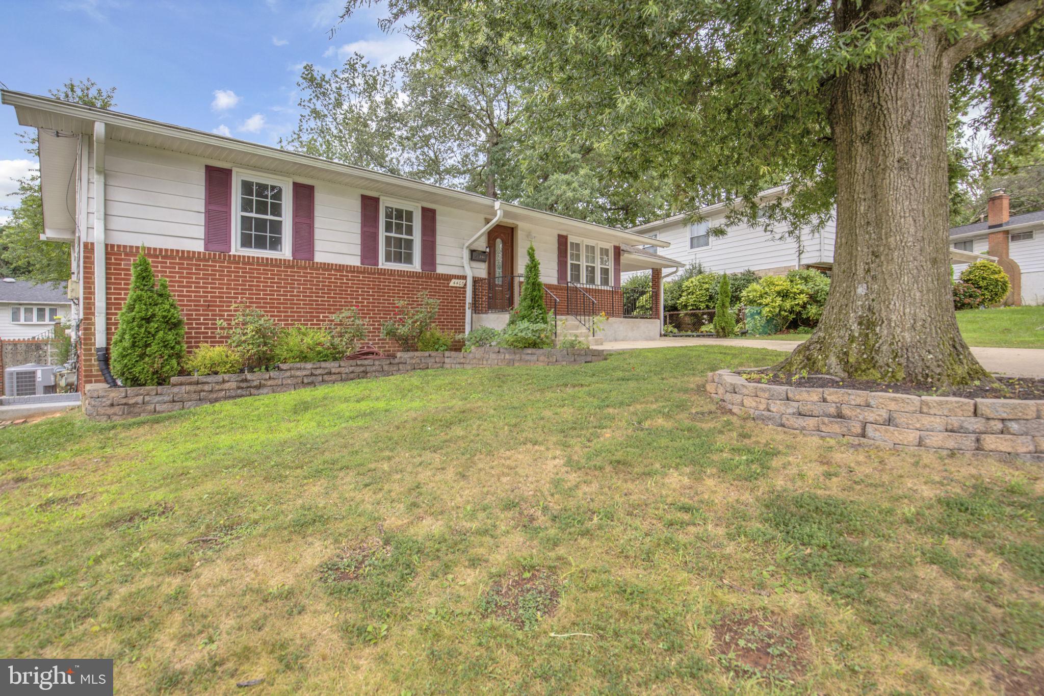 4403 Kinmount Road Lanham, MD 20706 - Photo 2 of 39 a view of a house with a yard