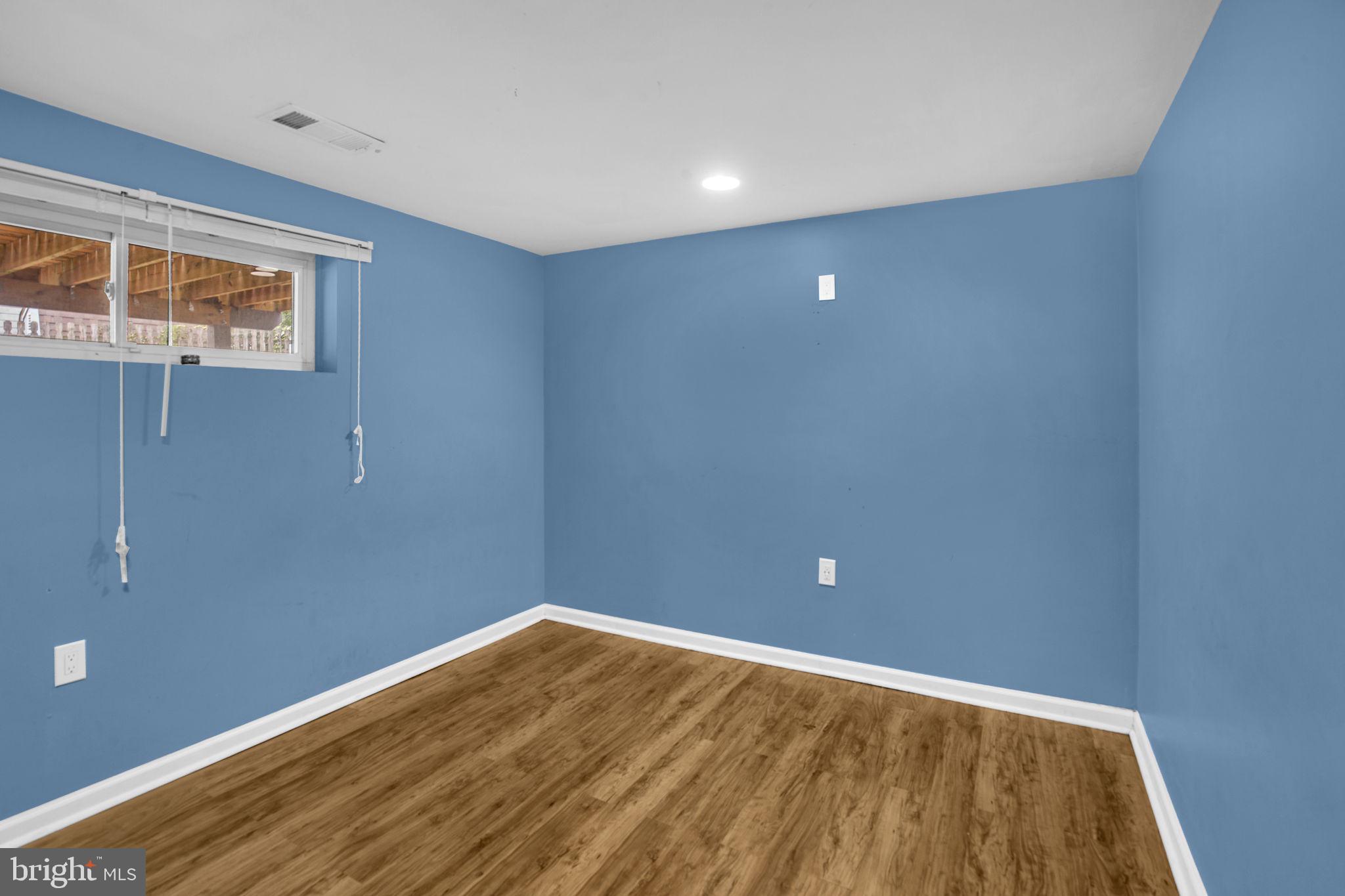 4403 Kinmount Road Lanham, MD 20706 - Photo 26 of 39 a view of empty room with wooden floor