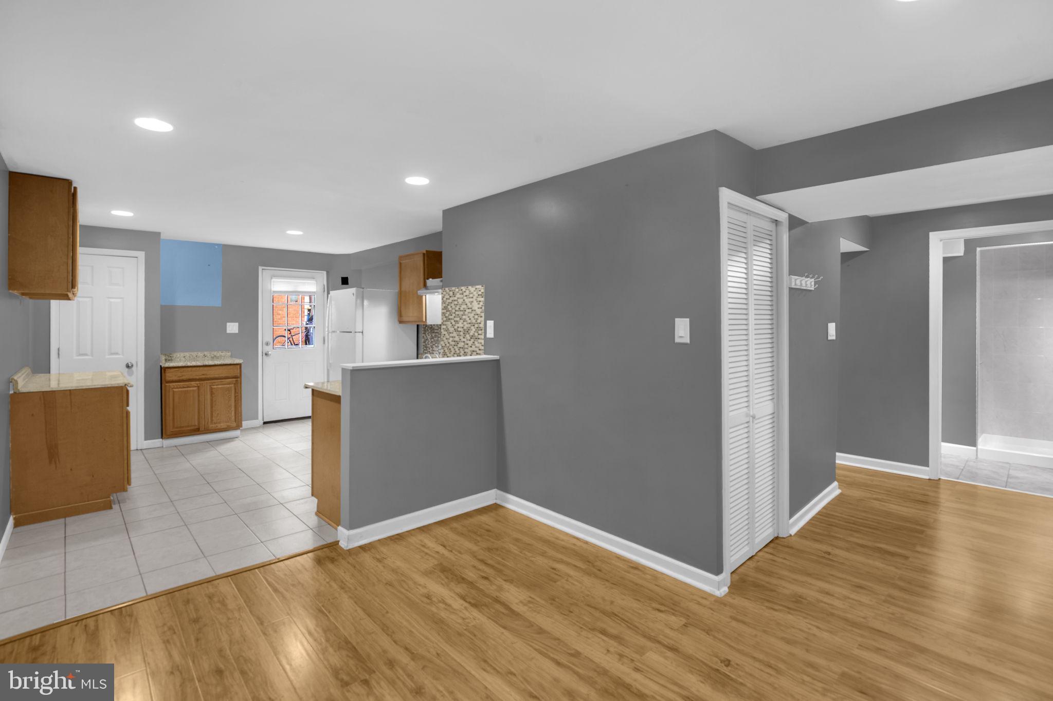 4403 Kinmount Road Lanham, MD 20706 - Photo 32 of 39 a view of a kitchen with wooden floor
