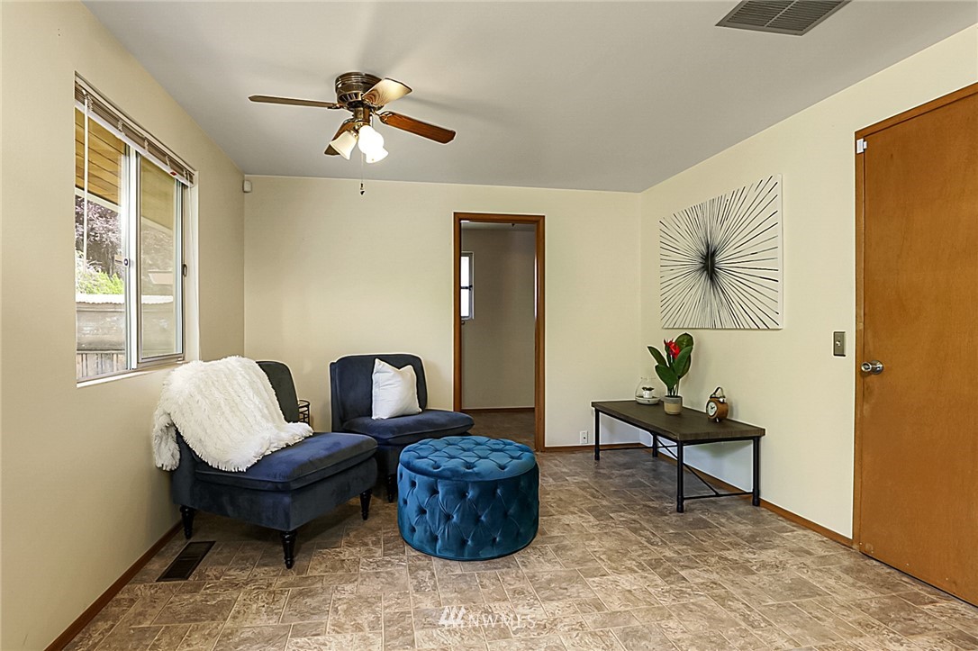 2608 Northeast 18th Street Renton, WA 98056 - Photo 11 of 20 a living room with furniture and a window