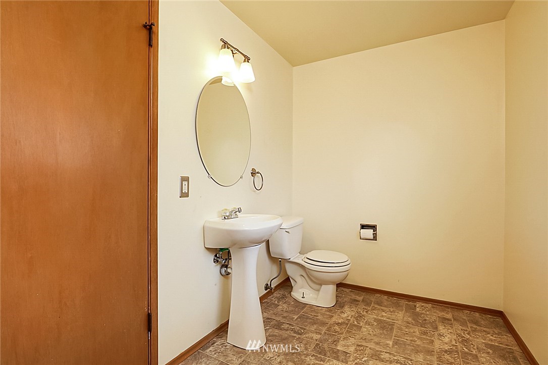 2608 Northeast 18th Street Renton, WA 98056 - Photo 17 of 20 a bathroom with a sink and a mirror
