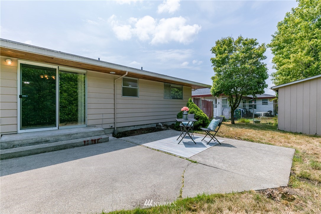 2608 Northeast 18th Street Renton, WA 98056 - Photo 18 of 20 a view of a house with a patio