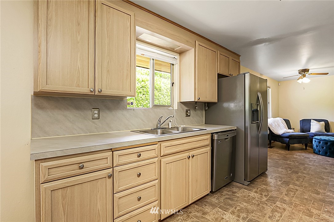 2608 Northeast 18th Street Renton, WA 98056 - Photo 8 of 20 a kitchen with appliances cabinets and a sink