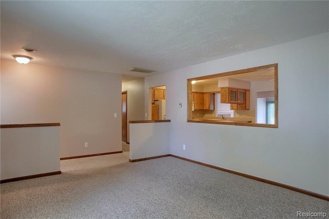52126 Romeo Plank Road Macomb, MI 48042 - Photo 15 of 30 LIVING ROOM - VIEW 2