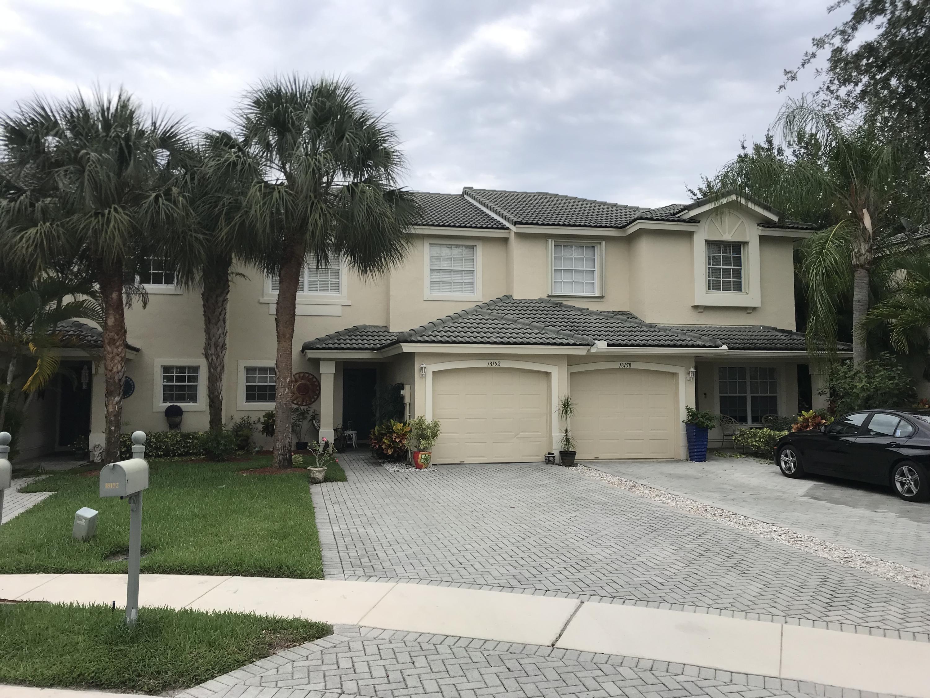 18152 Boca Way Drive Boca Raton, FL 33498 - Photo 1 of 6 a view of a house with a garden