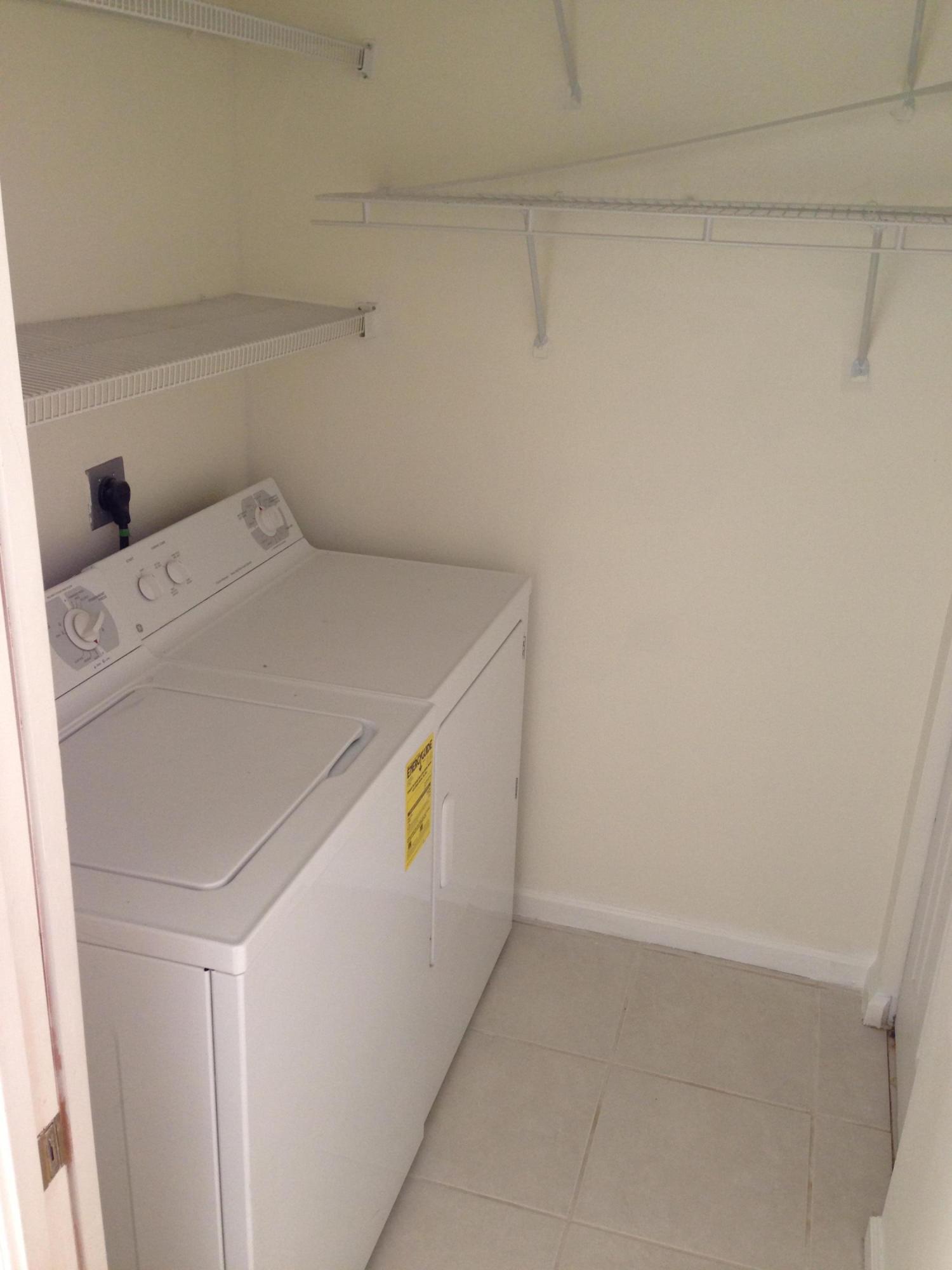 18152 Boca Way Drive Boca Raton, FL 33498 - Photo 5 of 6 a utility room with dryer and washer