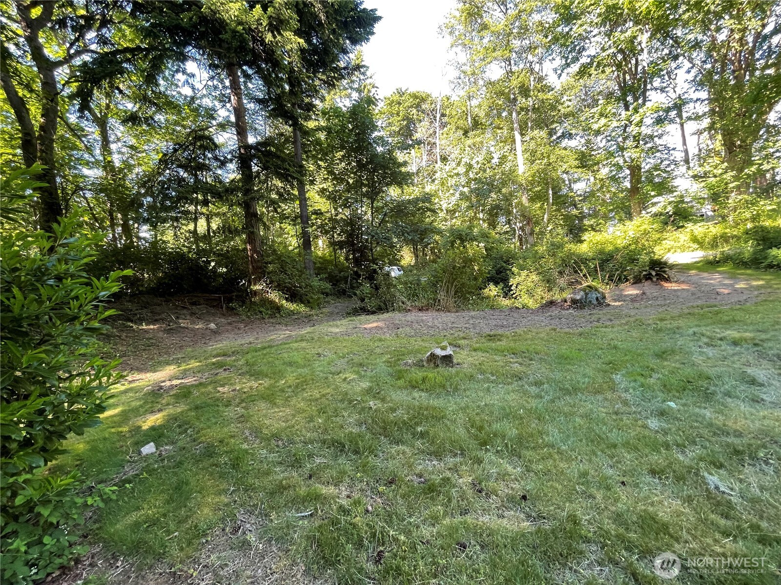 13 K Beach Way Everett, WA 98201 - Photo 18 of 35 a view of a green field with lots of bushes