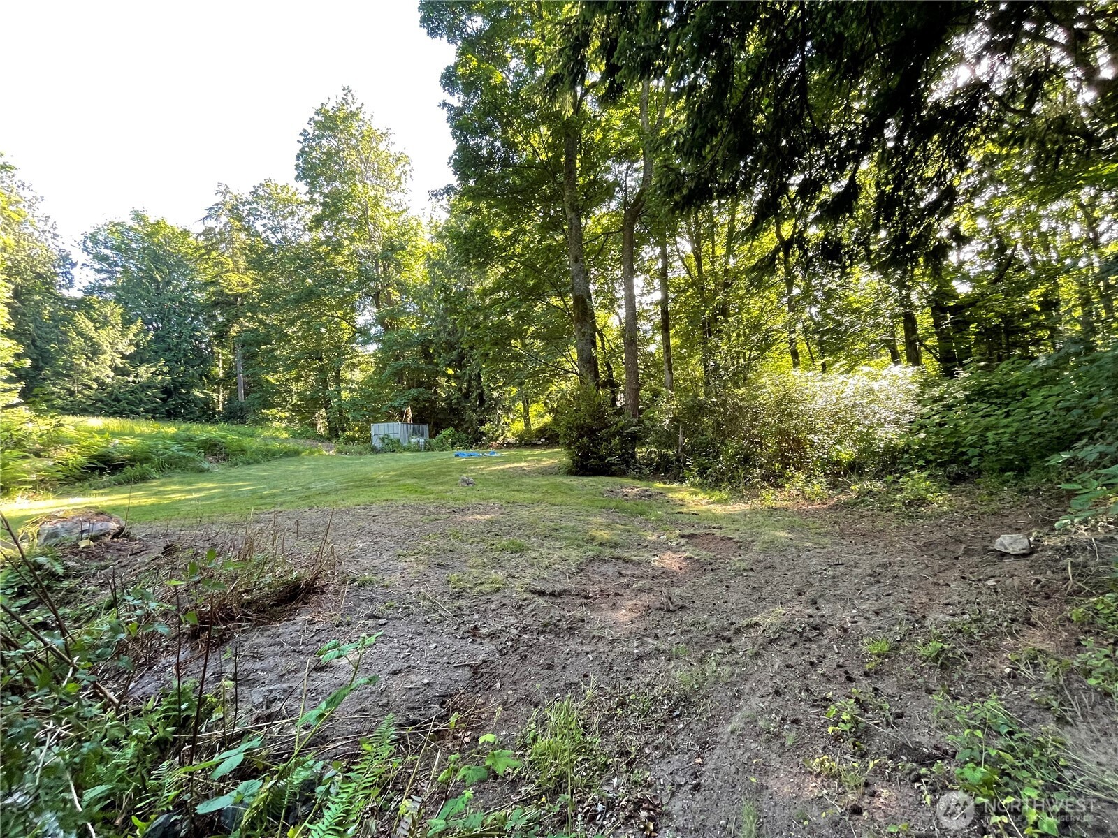 13 K Beach Way Everett, WA 98201 - Photo 19 of 35 a view of a field with trees in the background