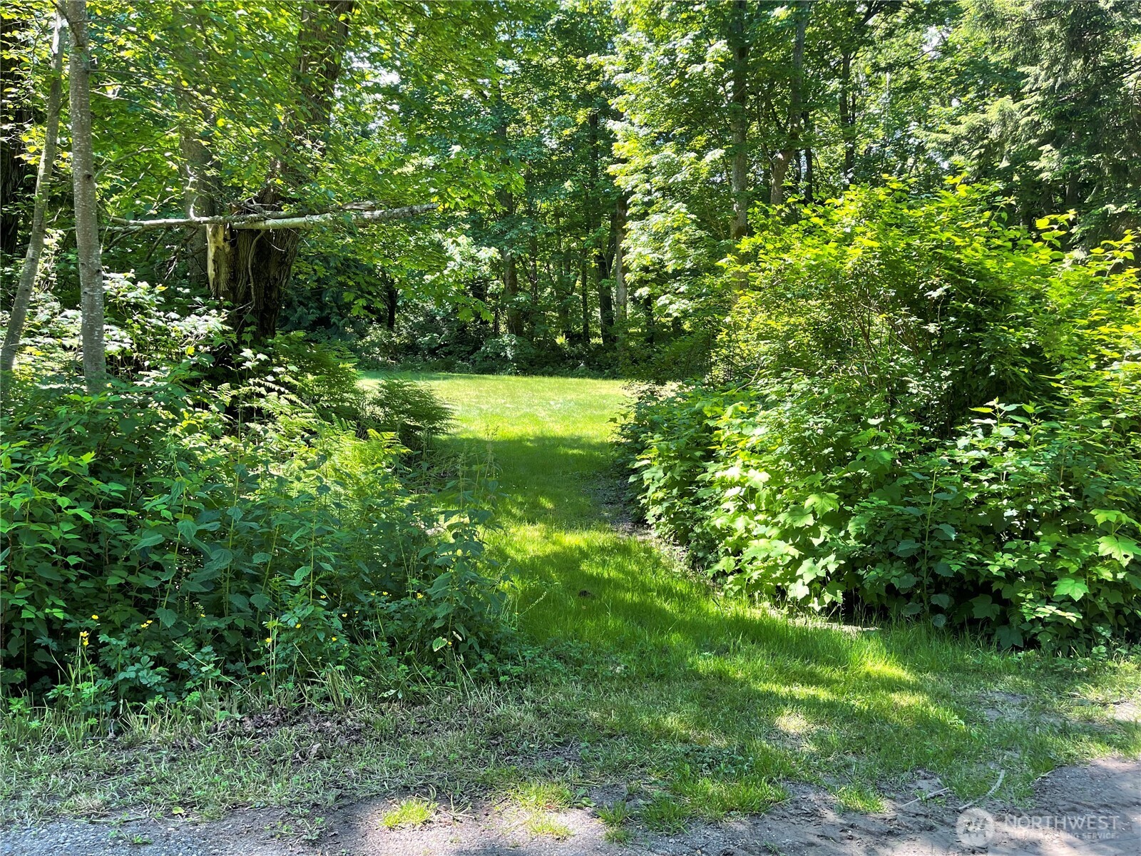13 K Beach Way Everett, WA 98201 - Photo 25 of 35 a view of a house with a backyard space