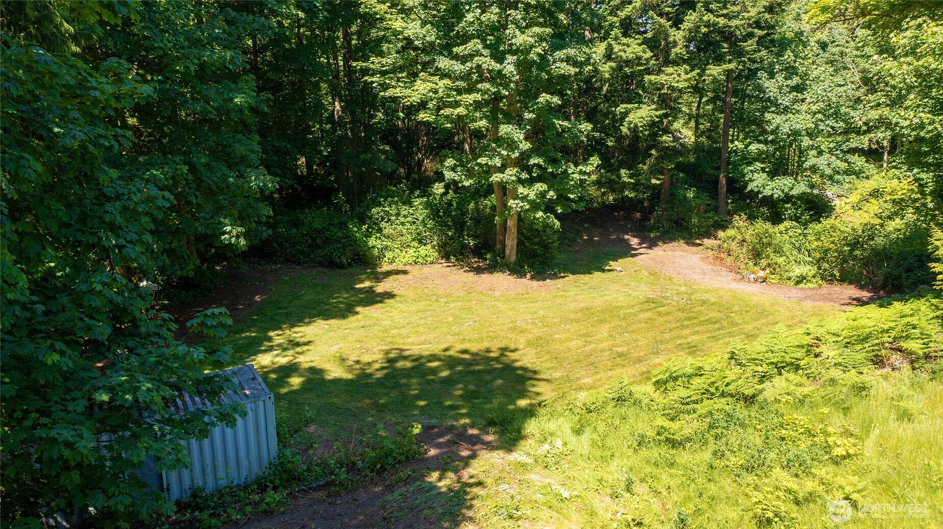13 K Beach Way Everett, WA 98201 - Photo 8 of 35 a view of a yard with a tree