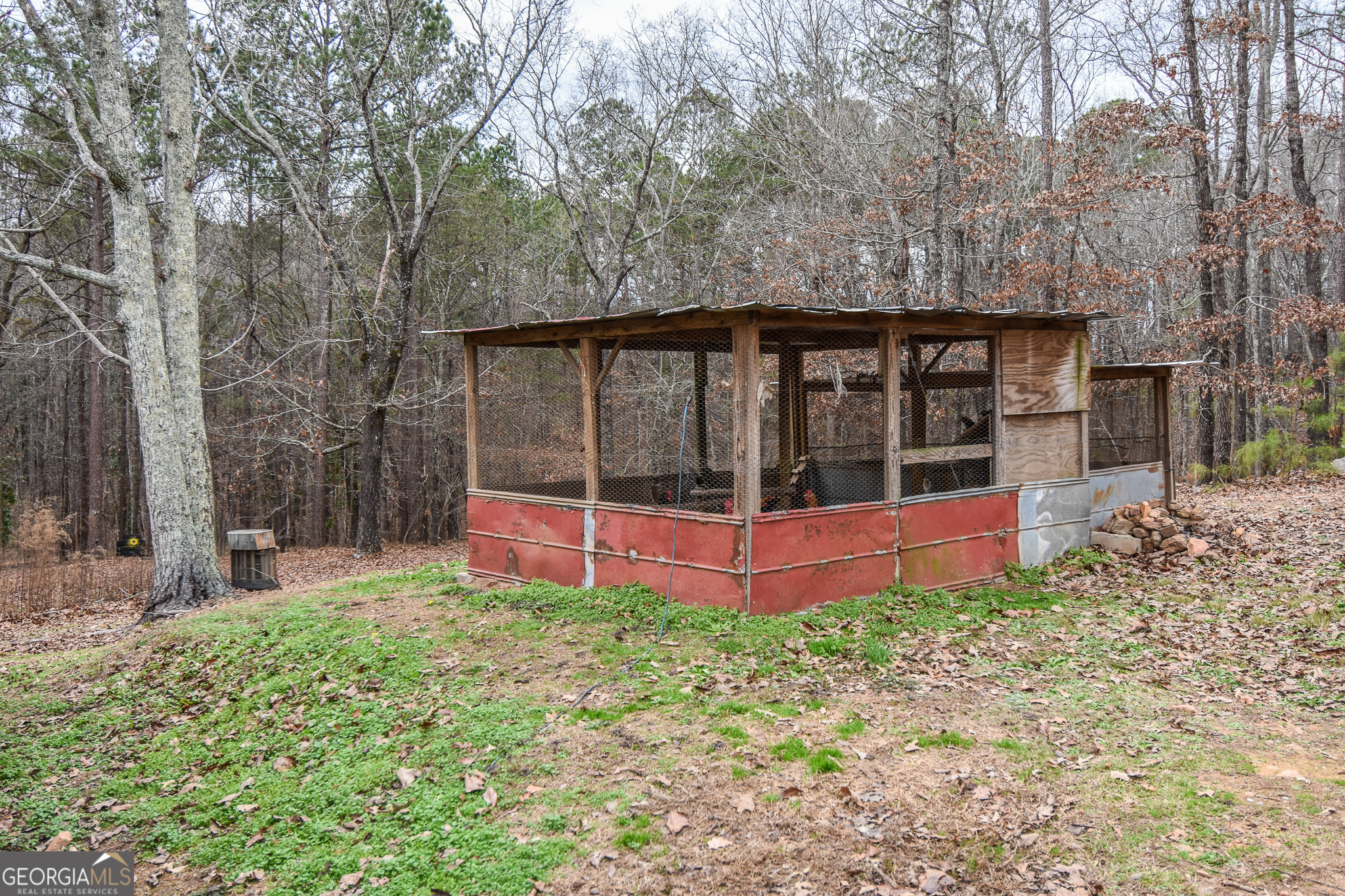 18 Ridgecrest Drive Thomaston, GA 30286 - Photo 14 of 53 a view of a backyard with a small cabin