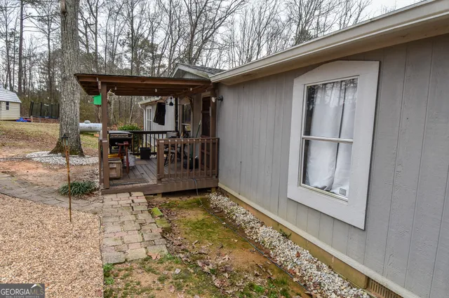 a patio with table and chairs
