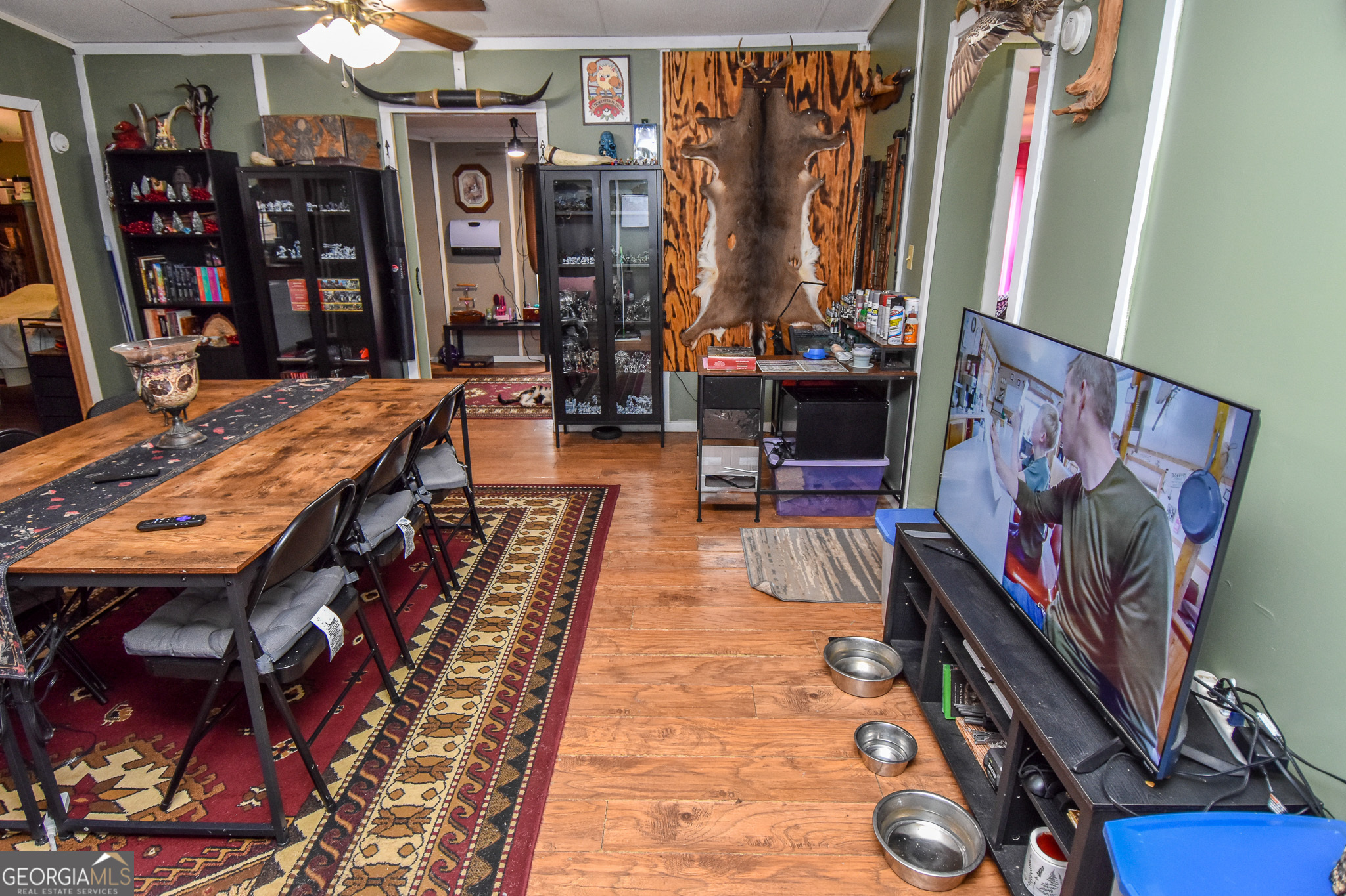 18 Ridgecrest Drive Thomaston, GA 30286 - Photo 27 of 53 a living room with furniture and a flat screen tv