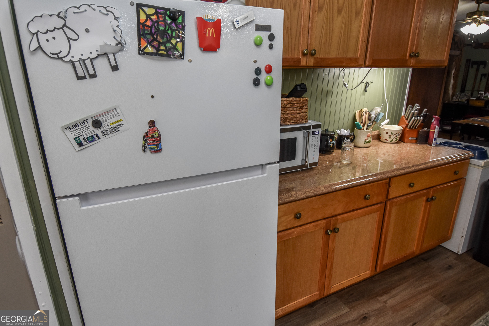 18 Ridgecrest Drive Thomaston, GA 30286 - Photo 31 of 53 a white refrigerator freezer sitting inside of a kitchen