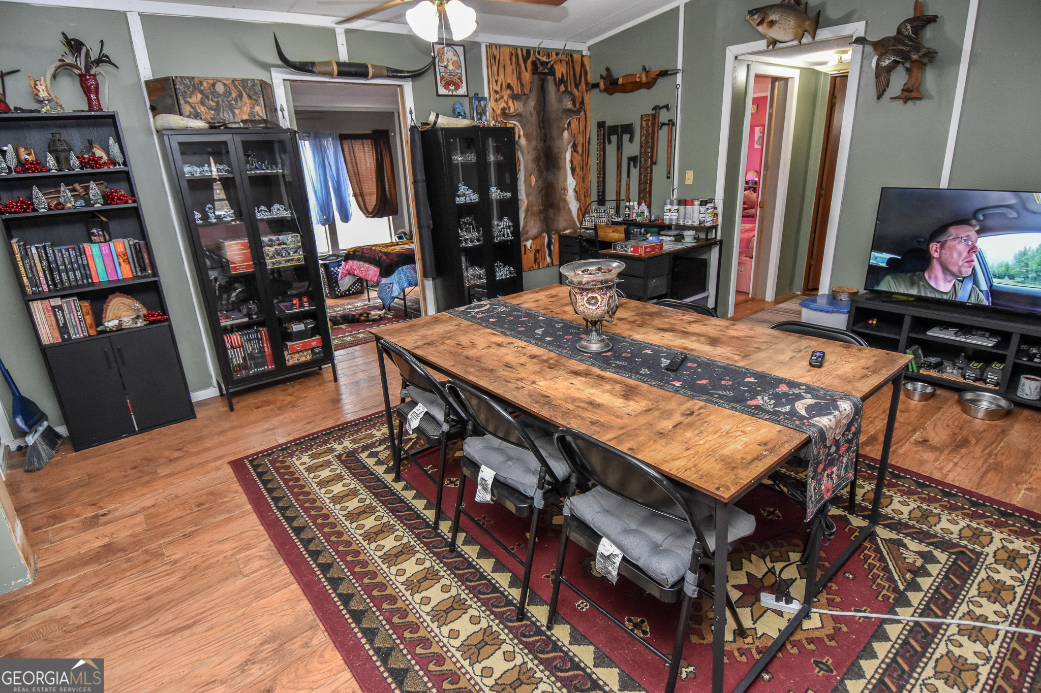 18 Ridgecrest Drive Thomaston, GA 30286 - Photo 33 of 53 a living room with lots of furniture and baby bed