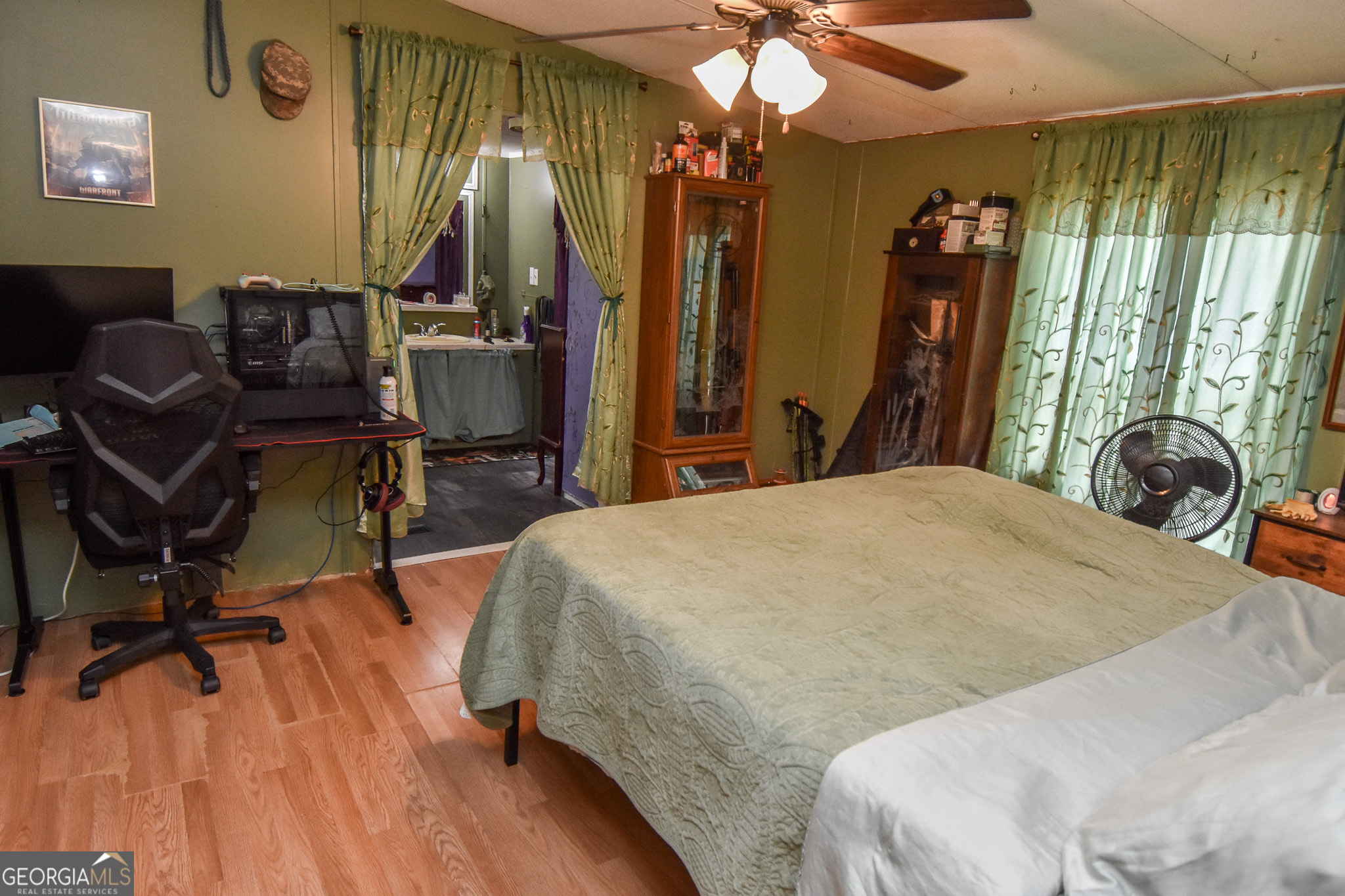 18 Ridgecrest Drive Thomaston, GA 30286 - Photo 34 of 53 a bed sitting in a bedroom next to a window