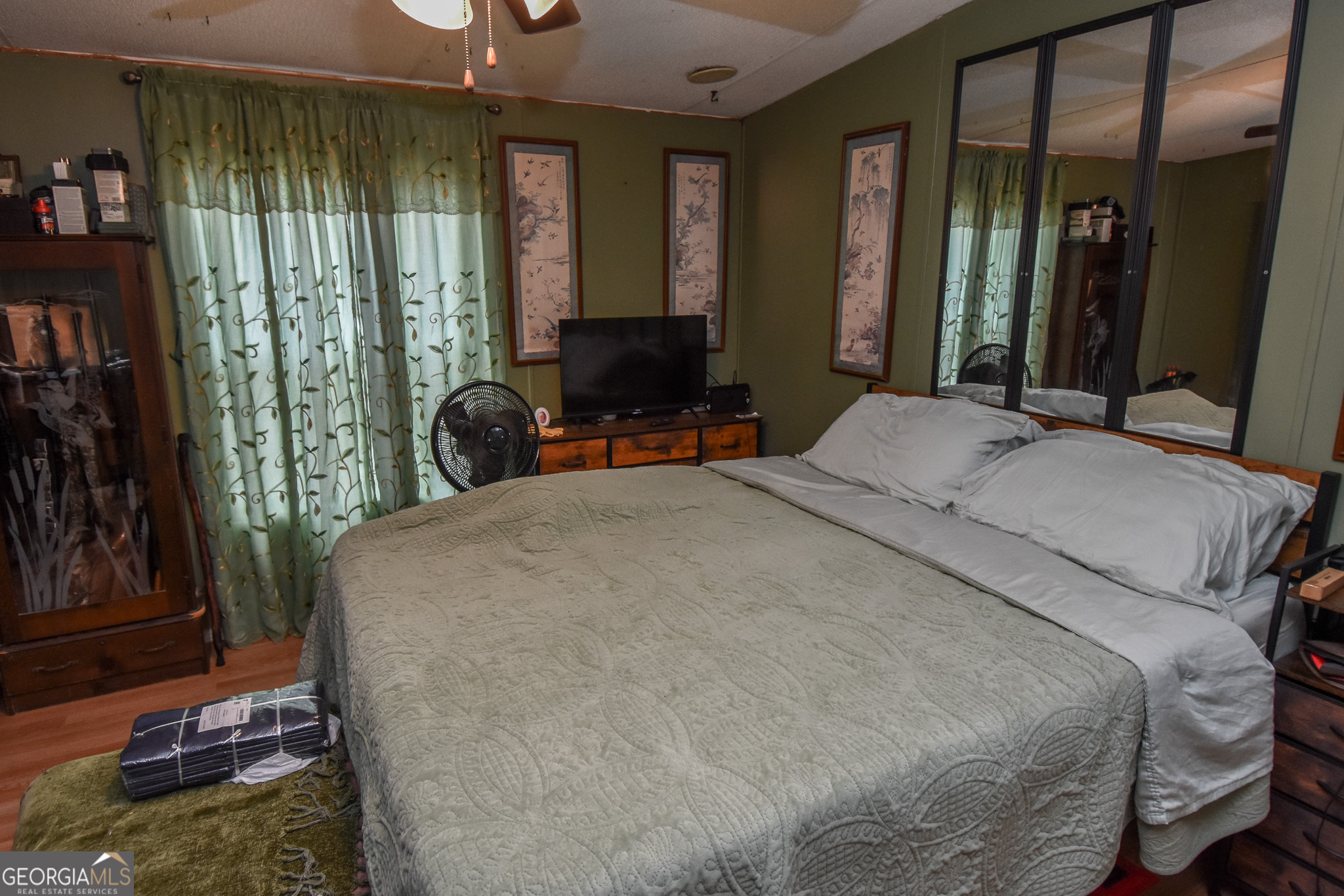 18 Ridgecrest Drive Thomaston, GA 30286 - Photo 43 of 53 a bed sitting in a bedroom next to a window