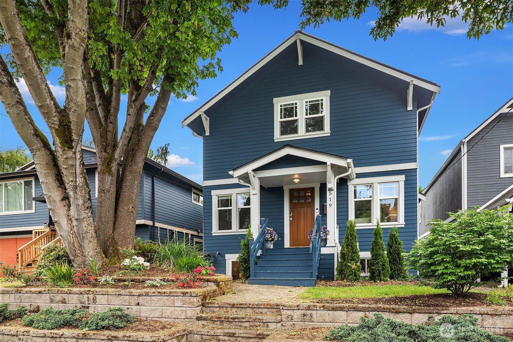 519 27th Avenue Seattle, WA 98122 - Photo 1 of 38 a front view of a house with a yard