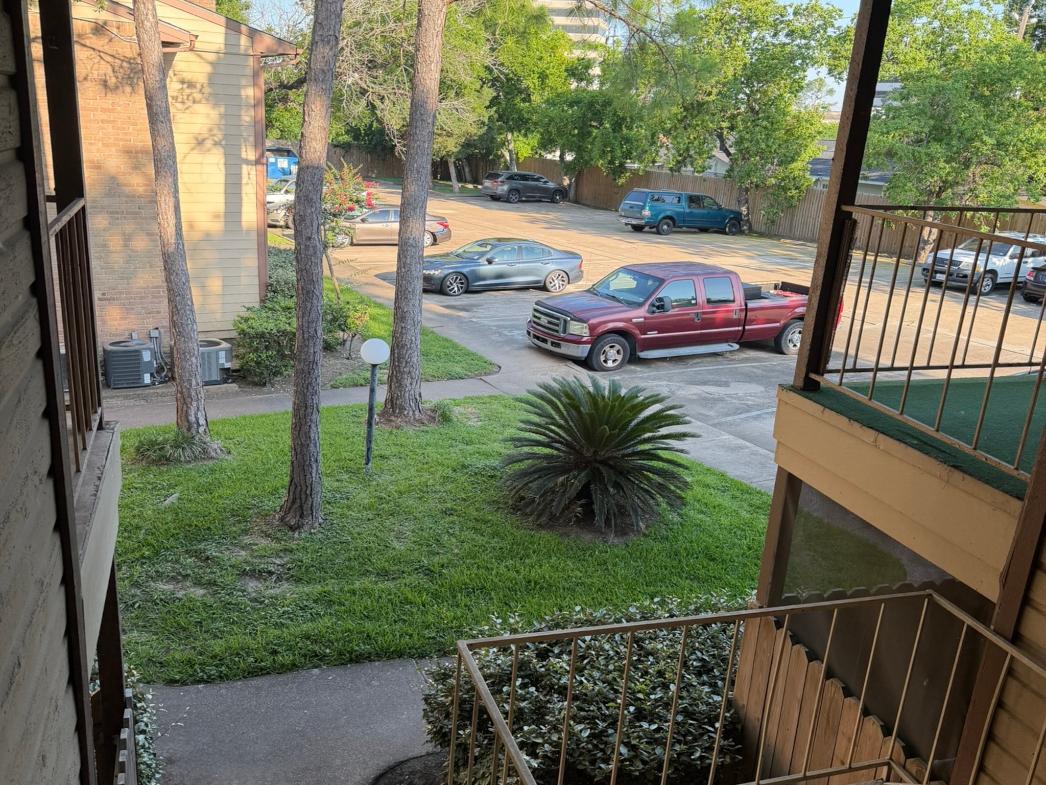 9000 Bissonnet Street, Unit 512 Houston, TX 77074 - Photo 13 of 13 a view of yard from deck having patio