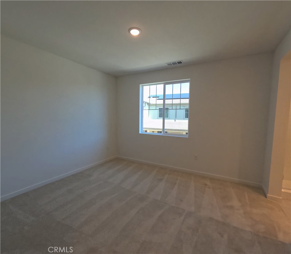 32336 Brunello Way Temecula, CA 92591 - Photo 15 of 25 an empty room with windows