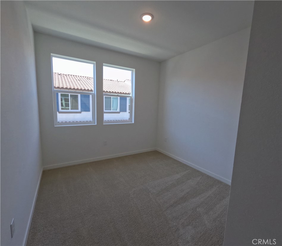32336 Brunello Way Temecula, CA 92591 - Photo 19 of 25 an empty room with a window