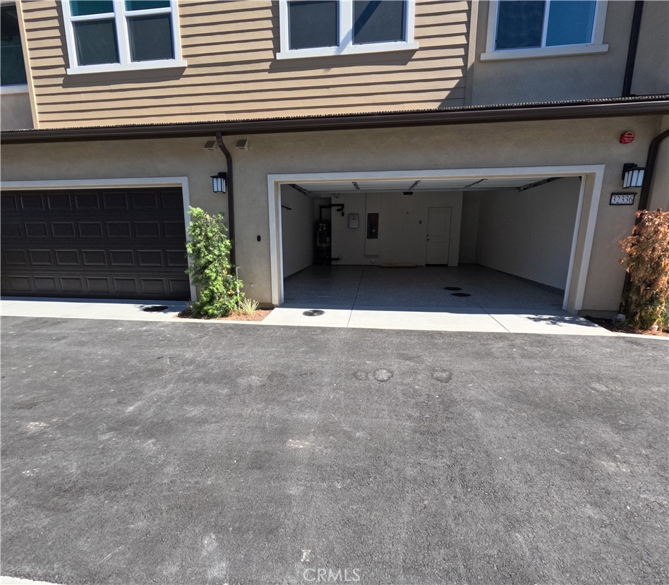 32336 Brunello Way Temecula, CA 92591 - Photo 21 of 25 a view of garage with a large window