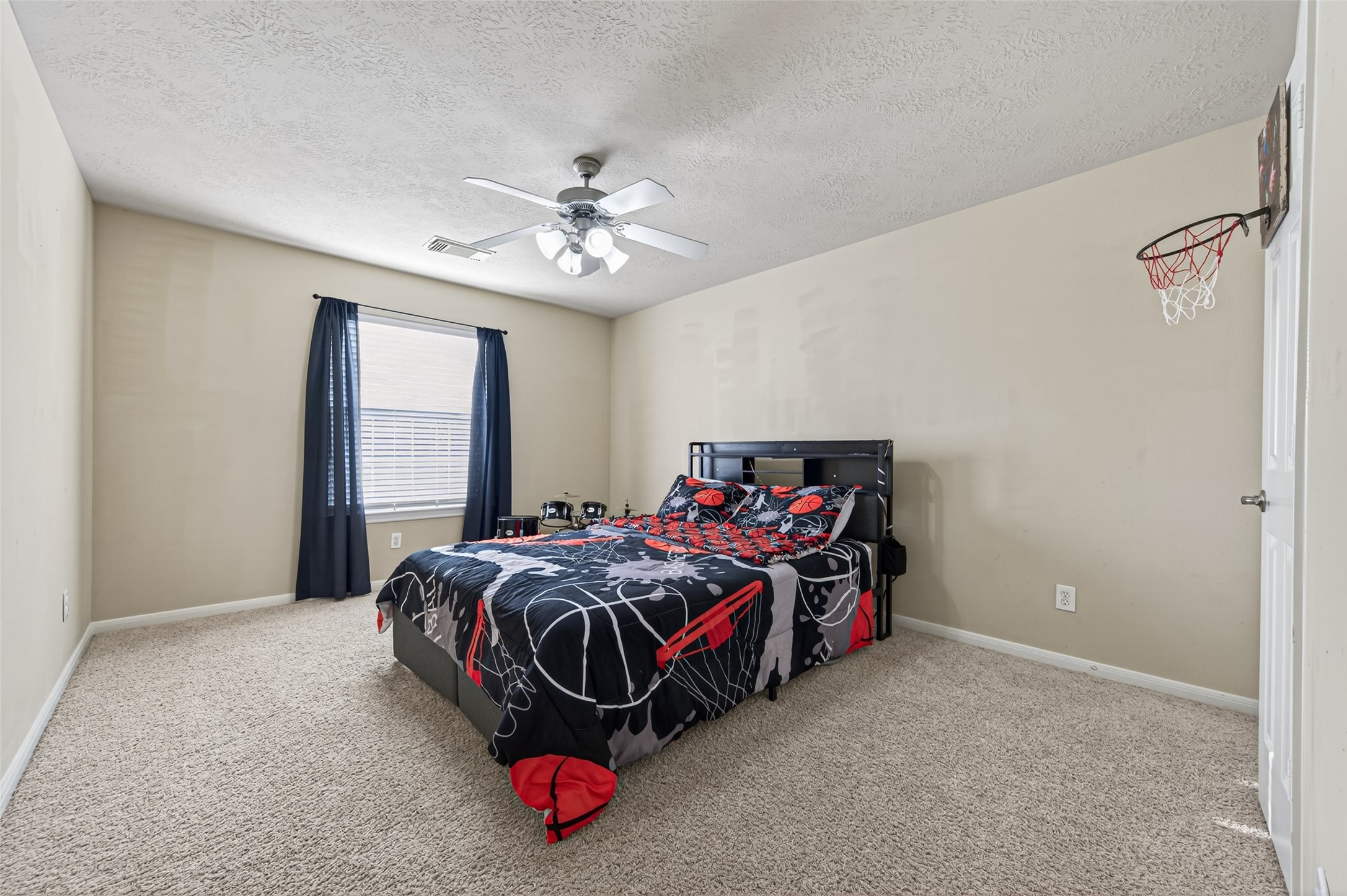 4602 Countrypines Drive Spring, TX 77388 - Photo 16 of 21 a bedroom with bed and window