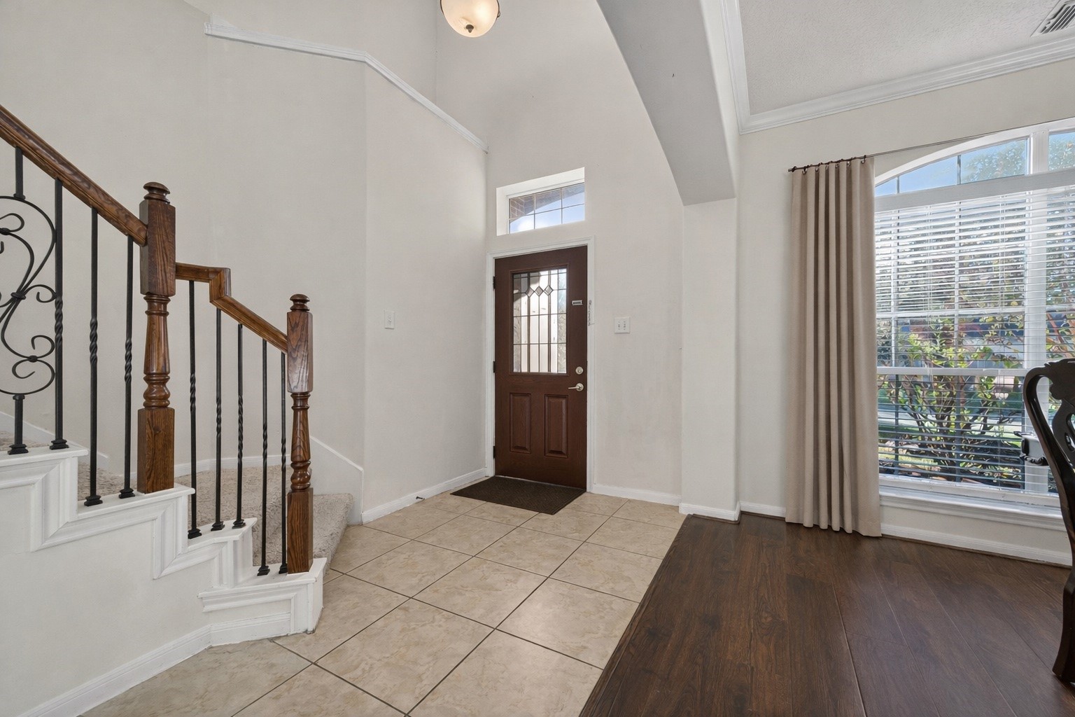 4602 Countrypines Drive Spring, TX 77388 - Photo 3 of 21 a view of a hallway with wooden floor and stairs
