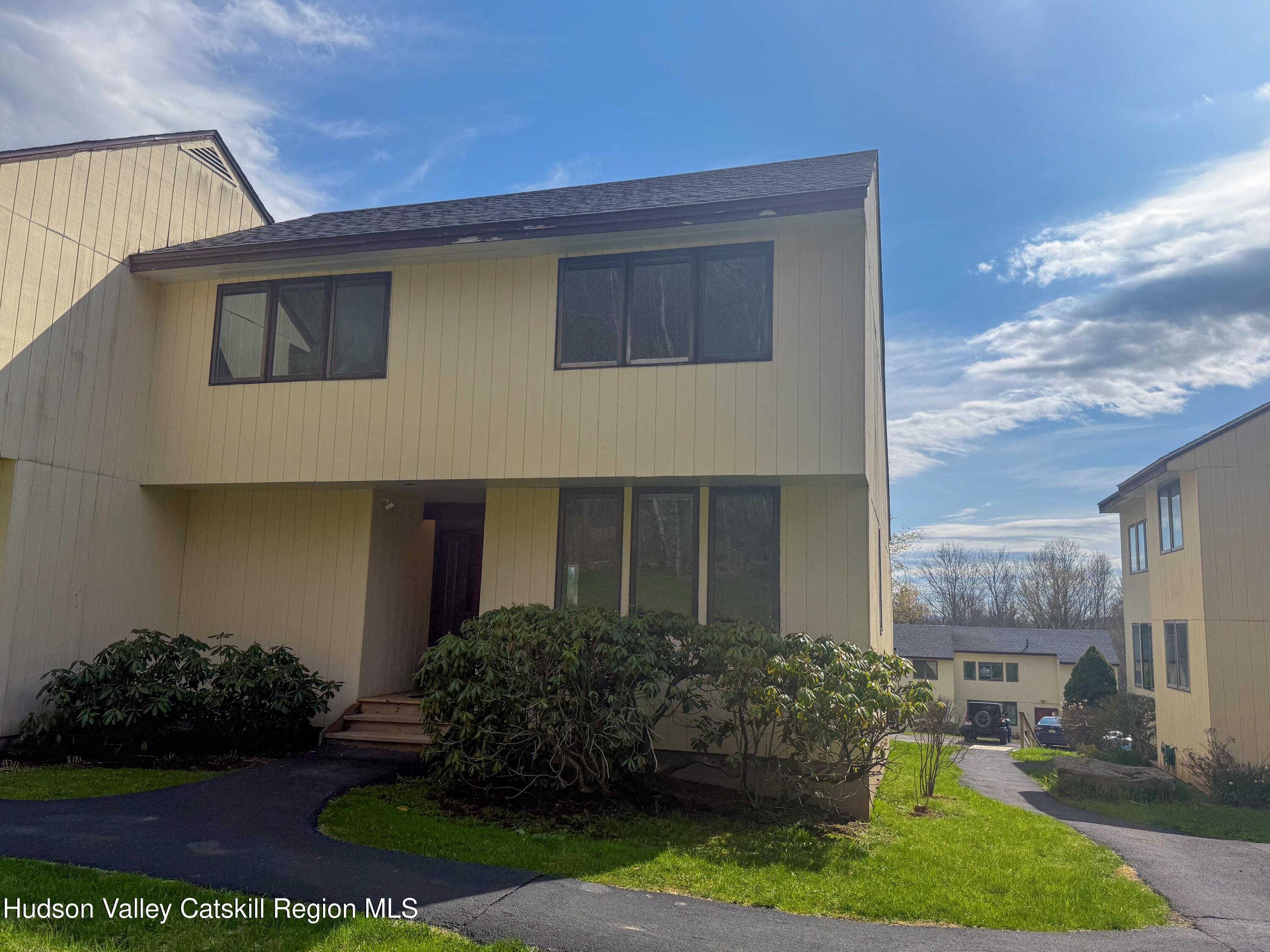 130 Pines Drive, Unit 59 Roxbury, NY 12421 - Photo 34 of 34 a house view with a garden space