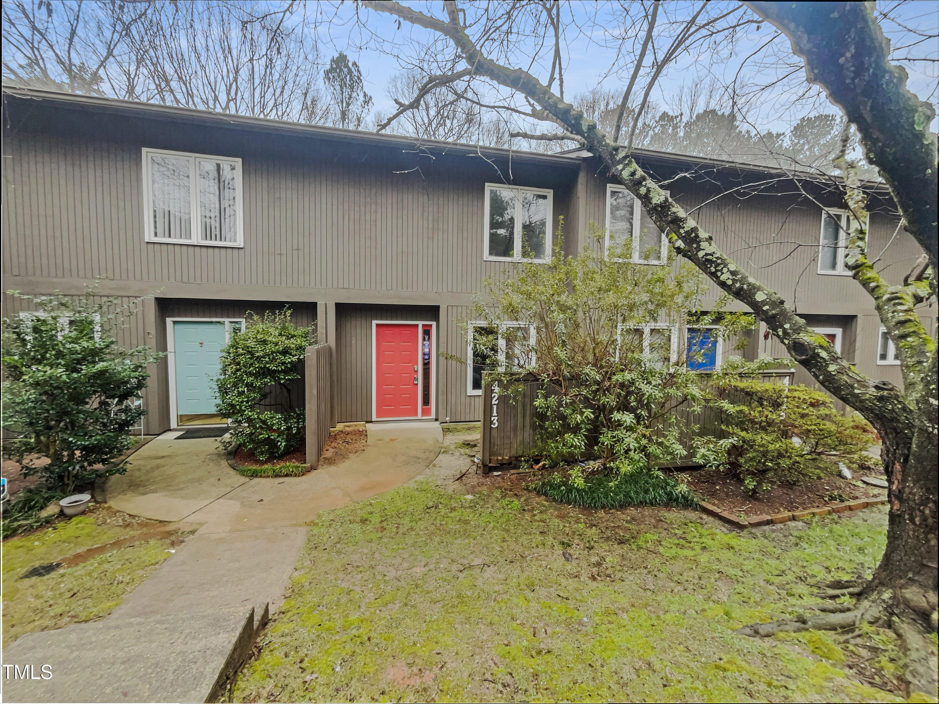 4213 Sunscape Lane Raleigh, NC 27613 - Photo 1 of 19 a view of a house with a yard and sitting area
