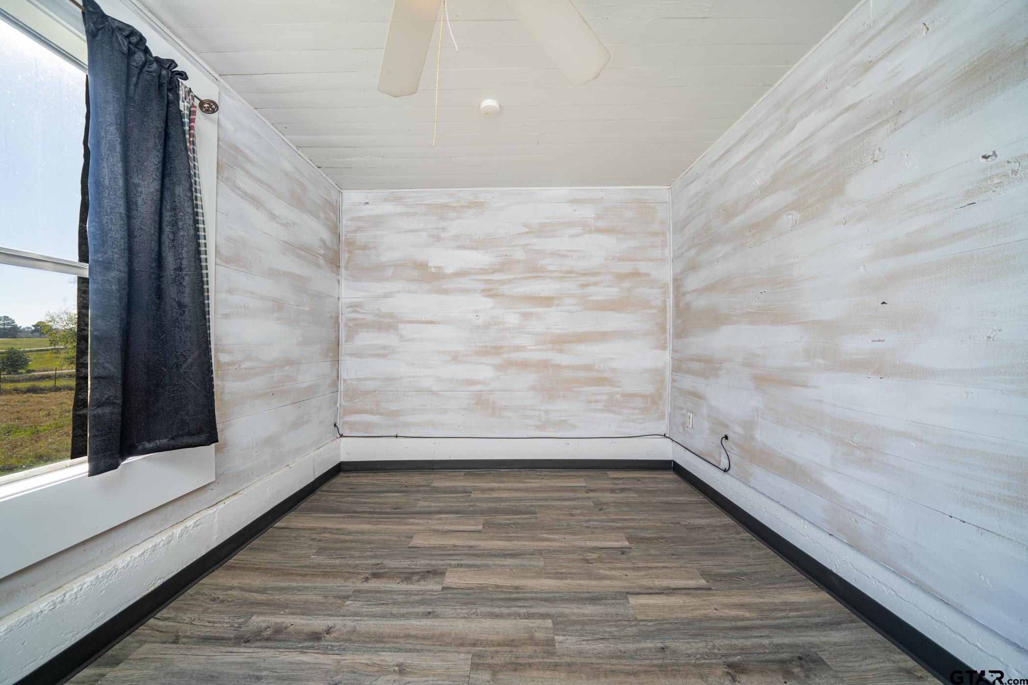 1855 Phillips Springs Road Gladewater, TX 75647 - Photo 31 of 36 a view of wooden floor