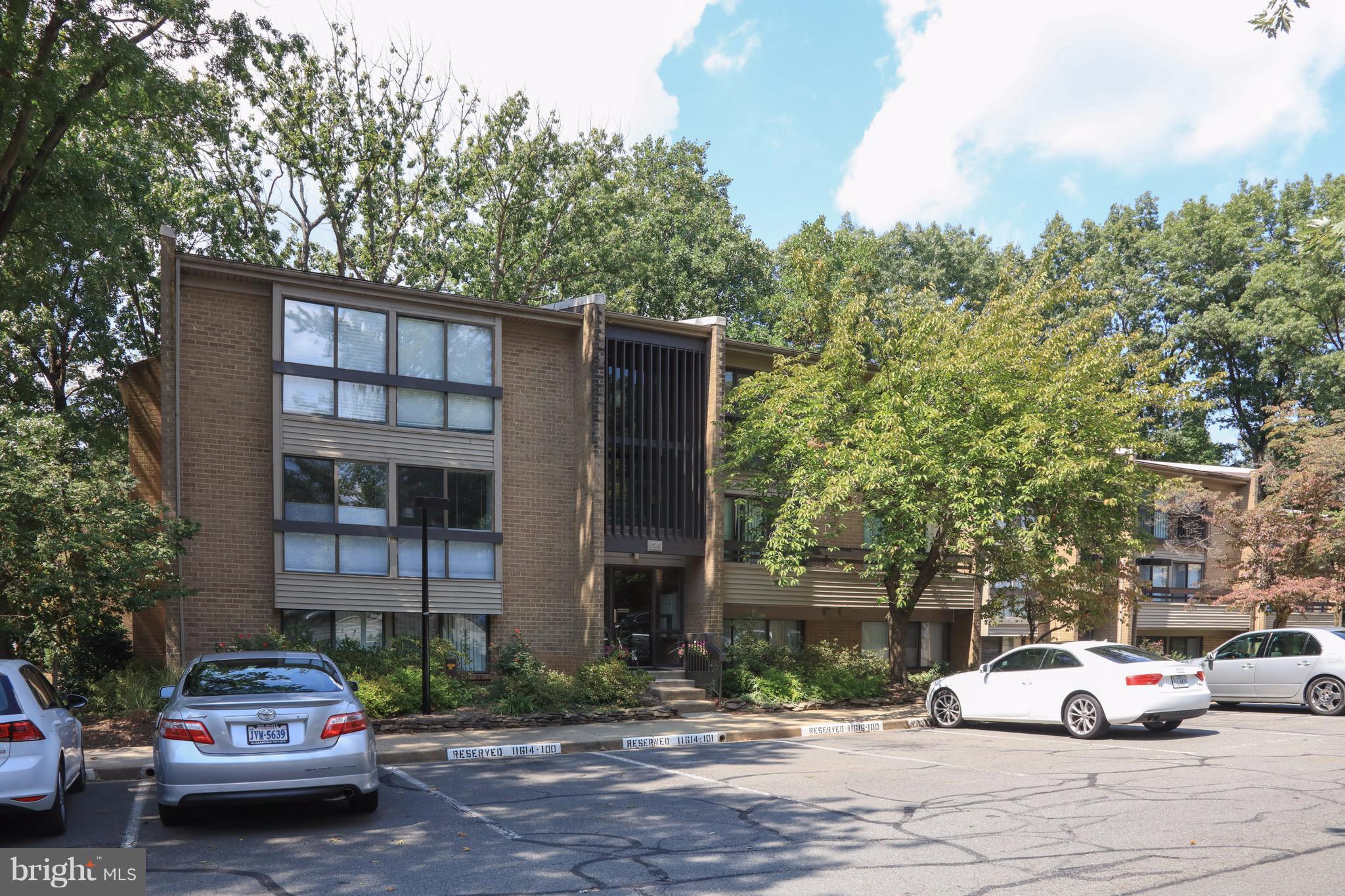 11616 Ivystone Court, Unit 301 Reston, VA 20191 - Photo 1 of 29 a car parked in front of a building